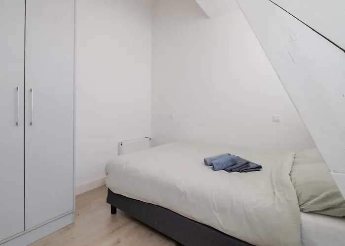 One Bedroom With Sloped Ceiling